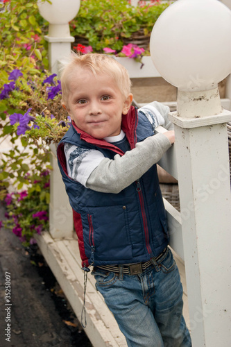 Little boy plaing in park photo