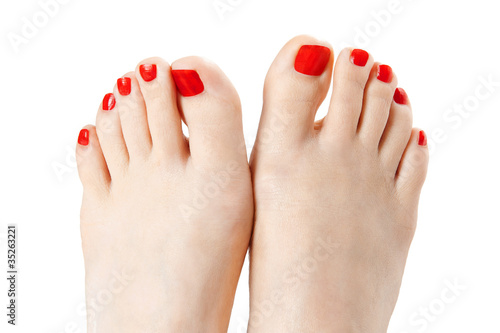 Фотография Red nail polish isolated on white background