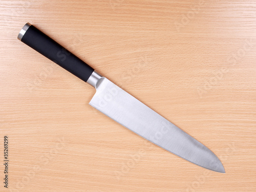 Kitchen knives on wood