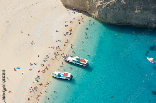 Top view of Navagio beach in Greece with boats