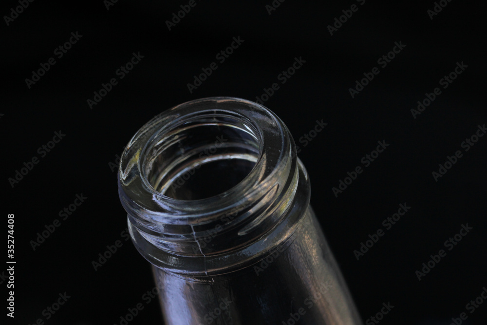 Bottle neck glass on black background