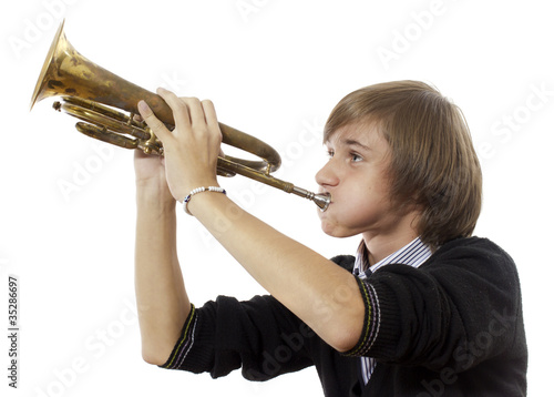Close-up of a man blowing the trumpet