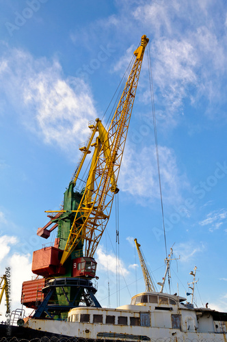 The large industrial crane for cargo containers in port