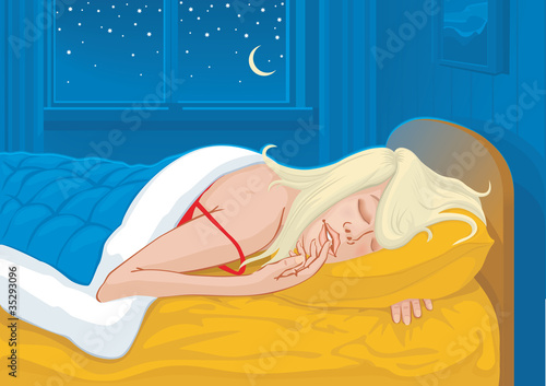 Young woman sleeping at her bed at the deep night