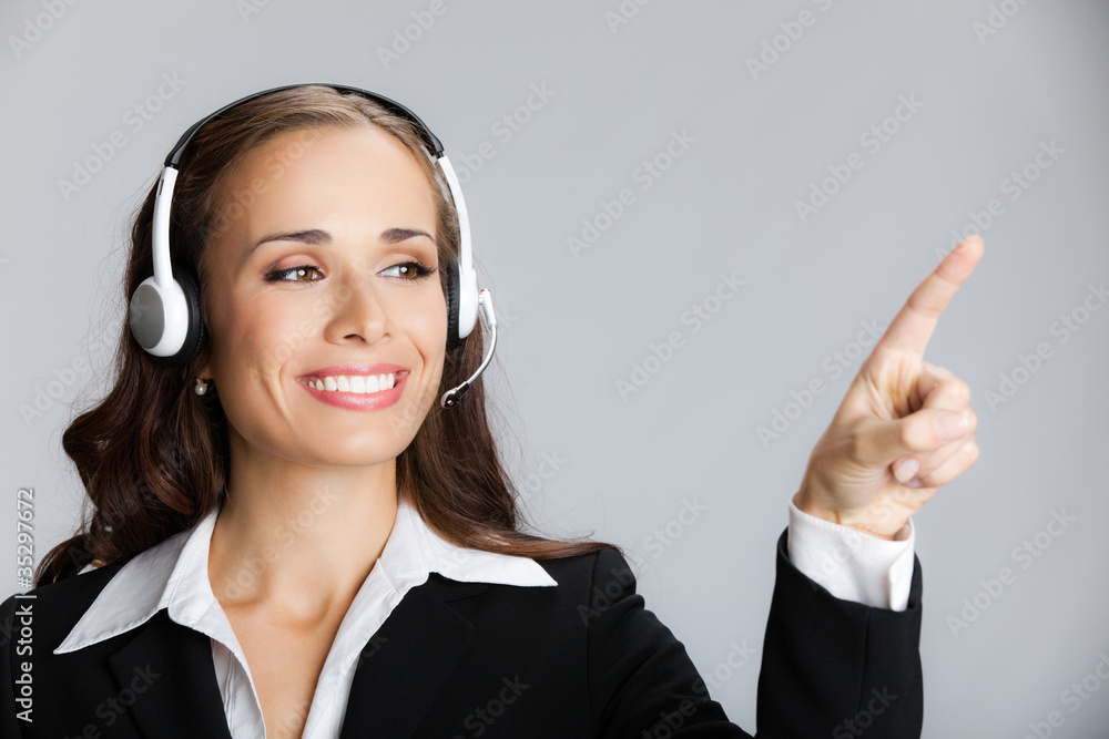 Support phone operator pointing, over grey Support phone operator pointing, over grey