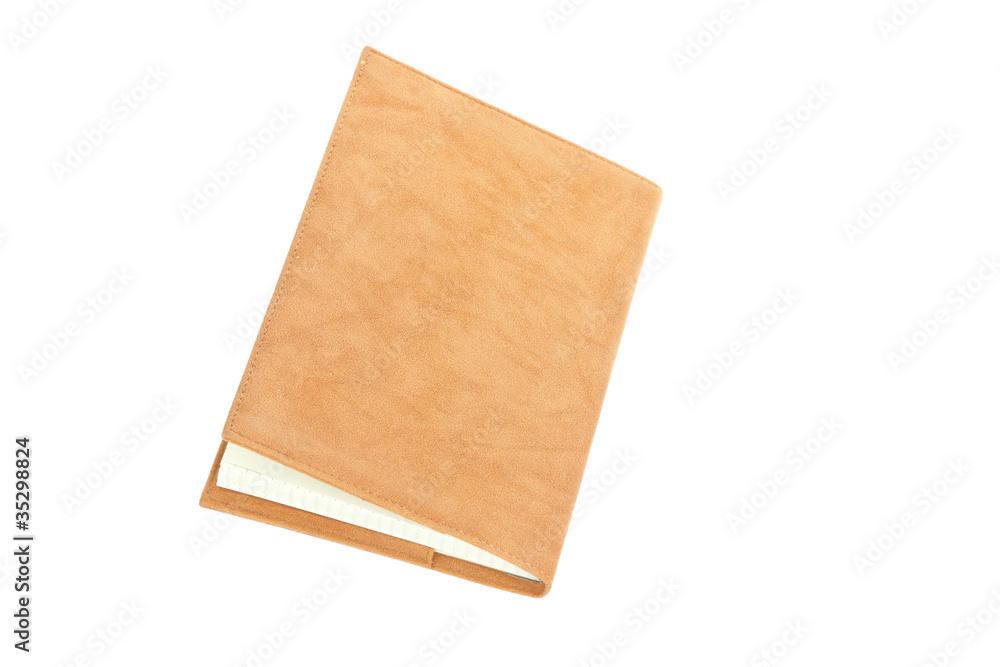One brown velvet book with bookmark isolated on white background One brown velvet book with bookmark isolated on white background