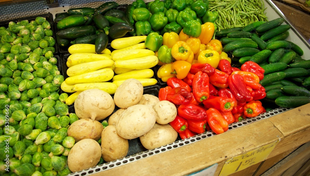 Grocery Store Bin full of brightly colored produce