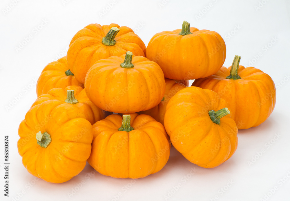 Fall pumpkins stacked for decoration Fall pumpkins stacked for decoration