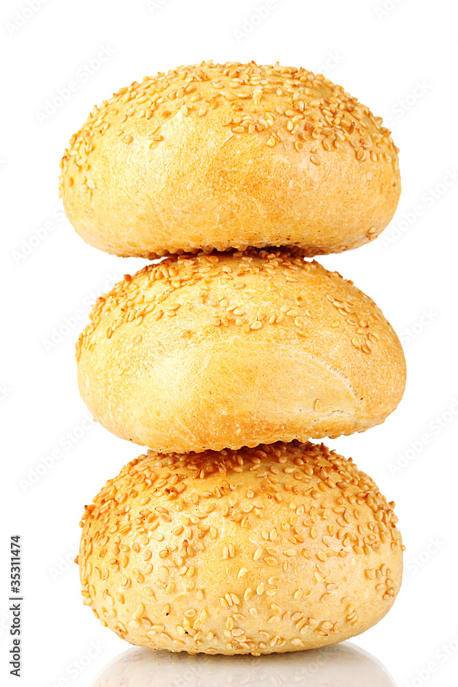 delicious buns with sesame seeds isolated on white delicious buns with sesame seeds isolated on white