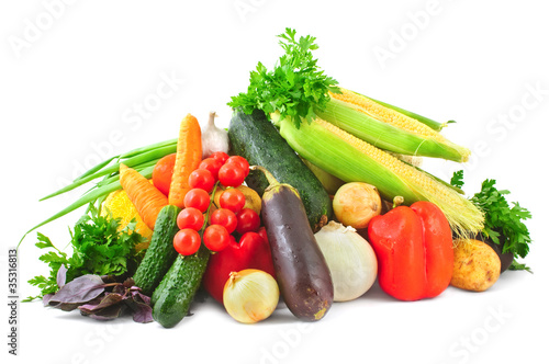 Heap of vegetables on white