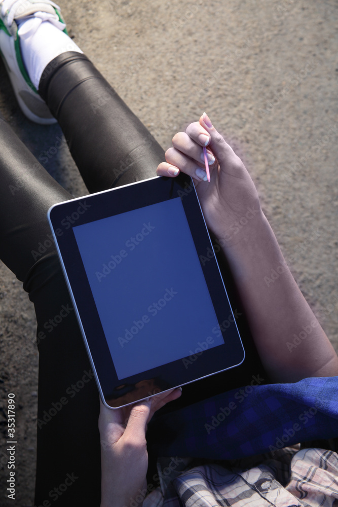 tablet pc in woman hand