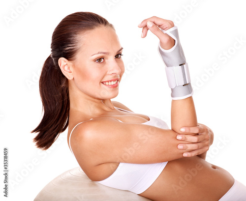 Woman with wrist brace. photo