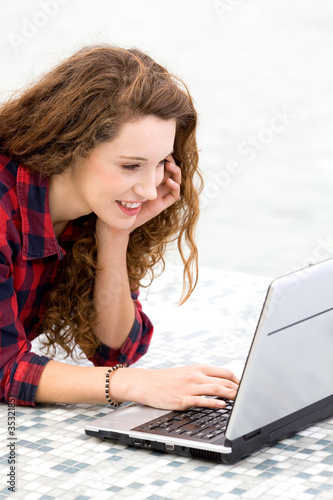 Young woman using laptop
