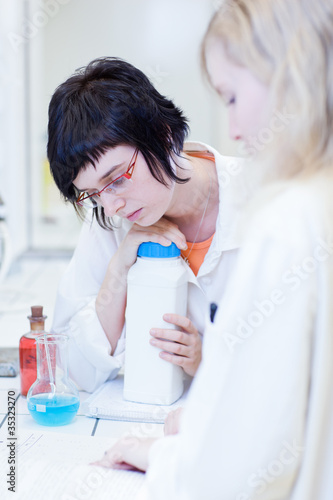 female researchers carrying out research together in a lab