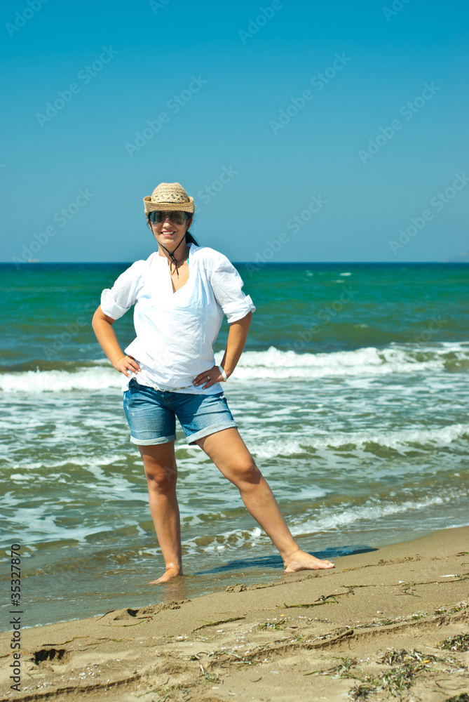 Cheerful woman on the beach