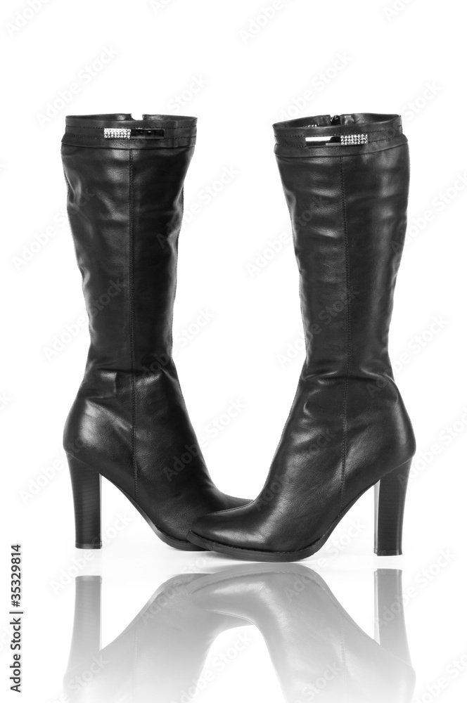 Fashion concept with boots on white Fashion concept with boots on white