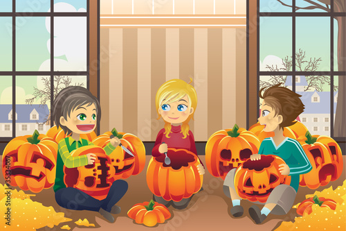 Kids carving pumpkins