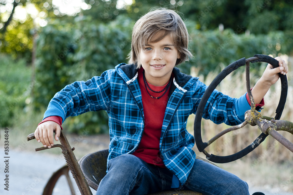 Obraz premium boy with tractor