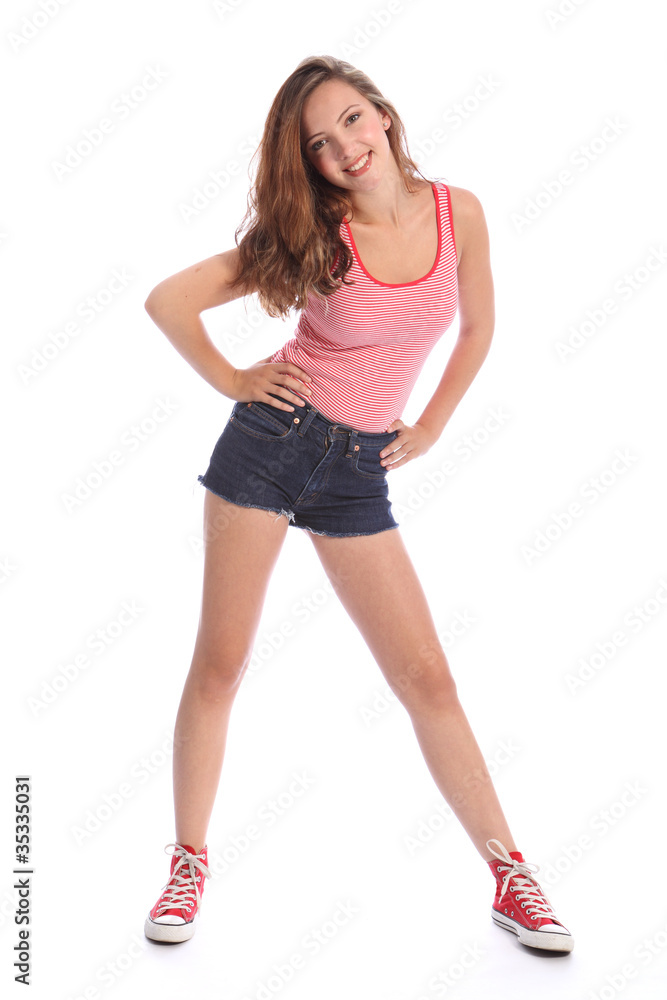 Beautiful young teenager girl in denim shorts Beautiful young teenager girl in denim shorts
