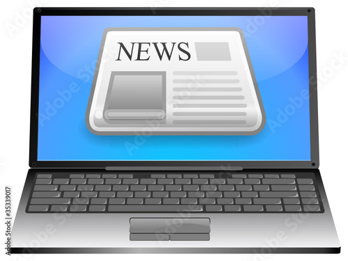 Laptop mit Zeitung