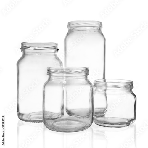 Four empty glass jars
