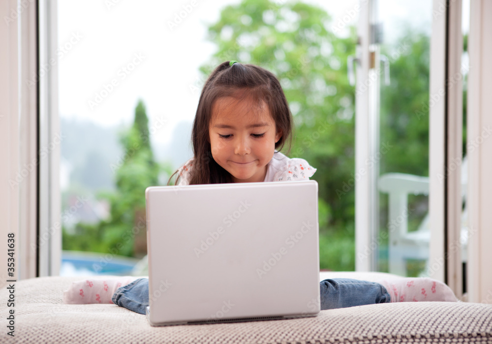 Cute Child Using Laptop Computer Cute Child Using Laptop Computer