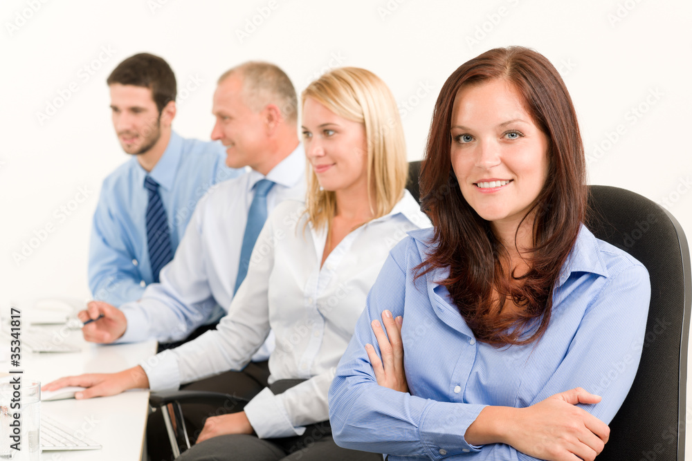 Business team happy sit in line behind table Business team happy sit in line behind table