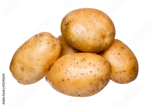 bunch of potatoes on white background