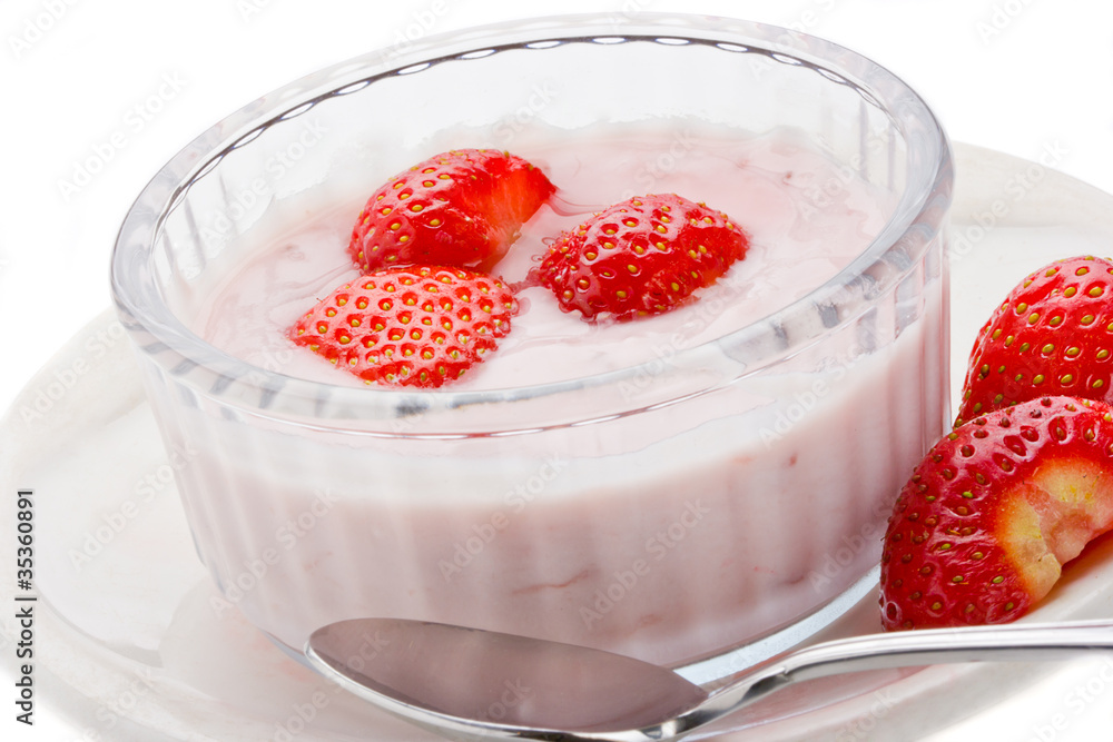 Strawberry yogurt with fresh strawberries in a glass bowl Strawberry yogurt with fresh strawberries in a glass bowl