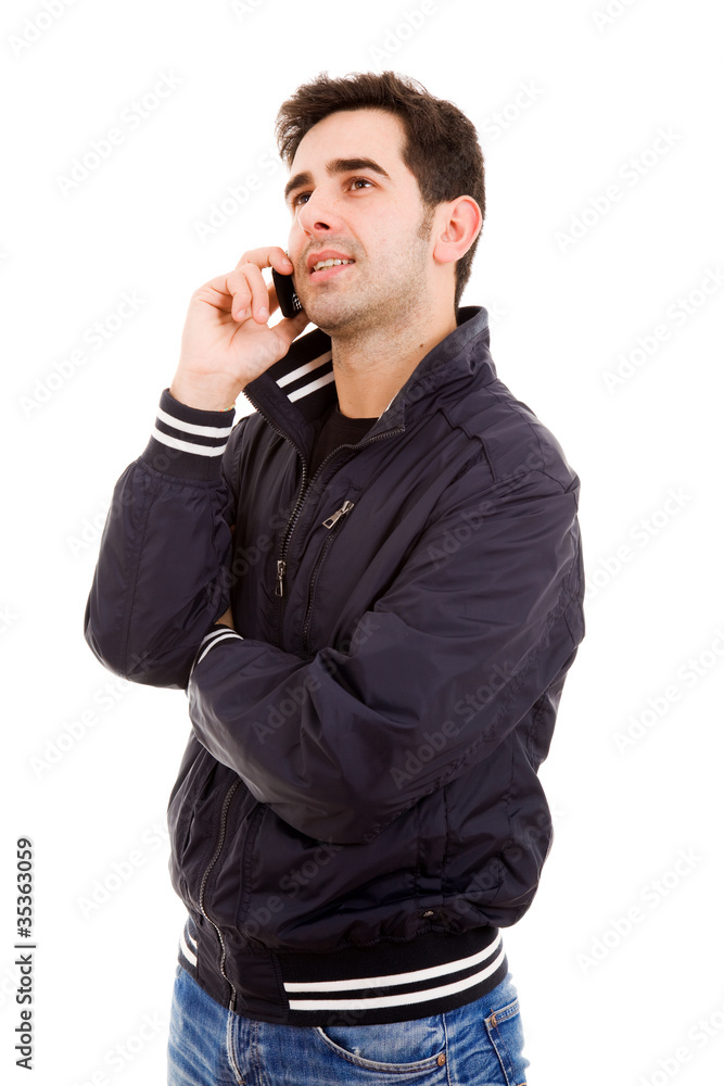 Young casual man on the phone, isolated on white Young casual man on the phone, isolated on white