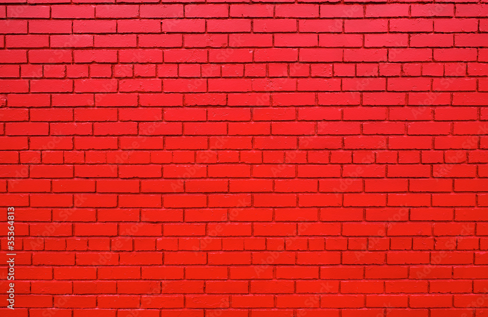 Fototapeta premium Red brick wall further back