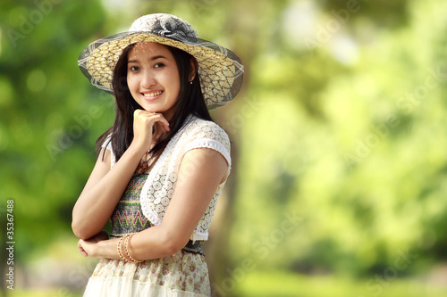young asian woman smiling outdoor