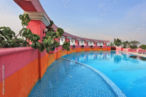 Photography Pink walls and blue water. The luxurious pool