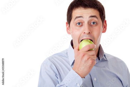 Man with green apple.