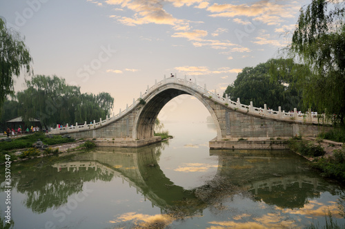 stone arch bridge in summer palace photo