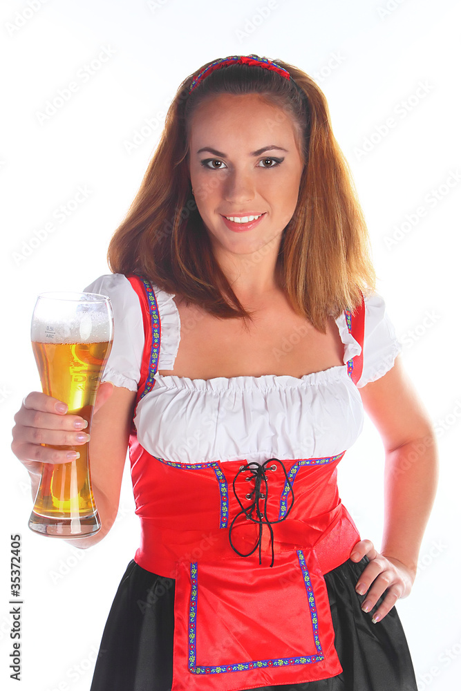 The girl in a traditional Bavarian dress The girl in a traditional Bavarian dress