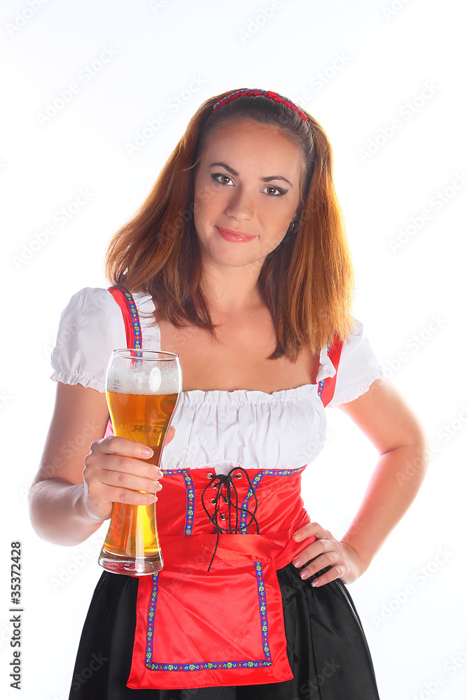 The girl in a traditional Bavarian dress The girl in a traditional Bavarian dress