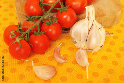 Garlic cloves and cherry tomatoes