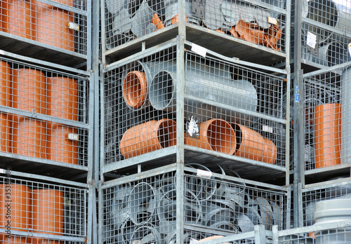 Stock gray and brown plastic pipe parts