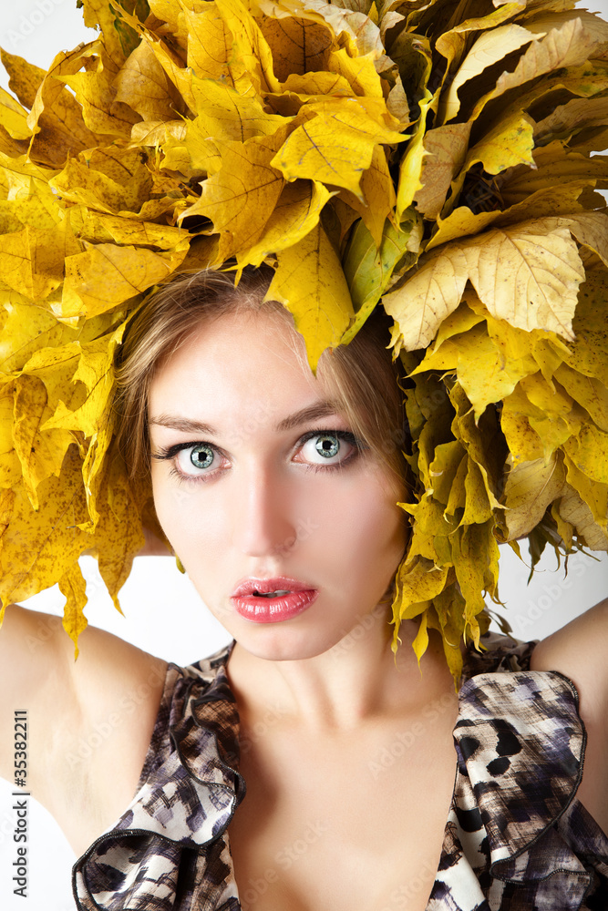 Woman in autumn wreath on her head.