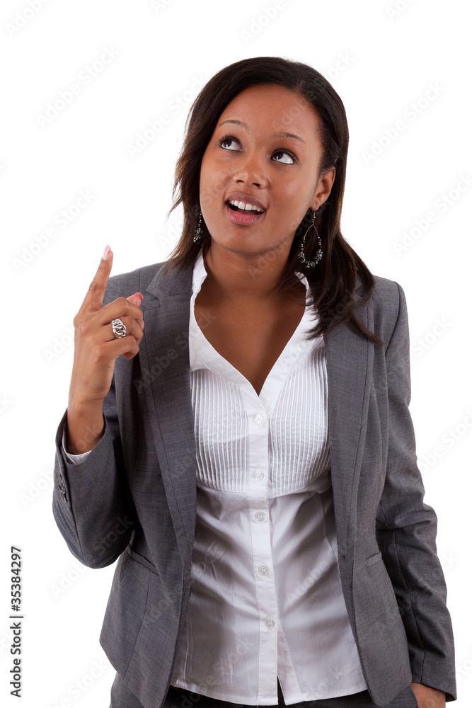 Young african american business woman looking up Young african american business woman looking up