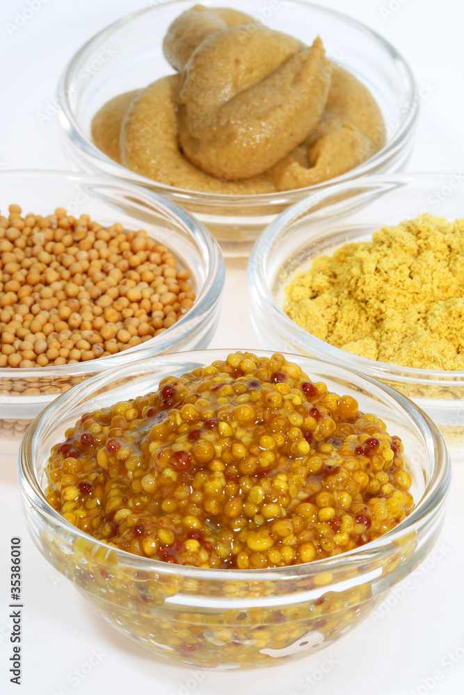 Mustard in a glass container Mustard in a glass container