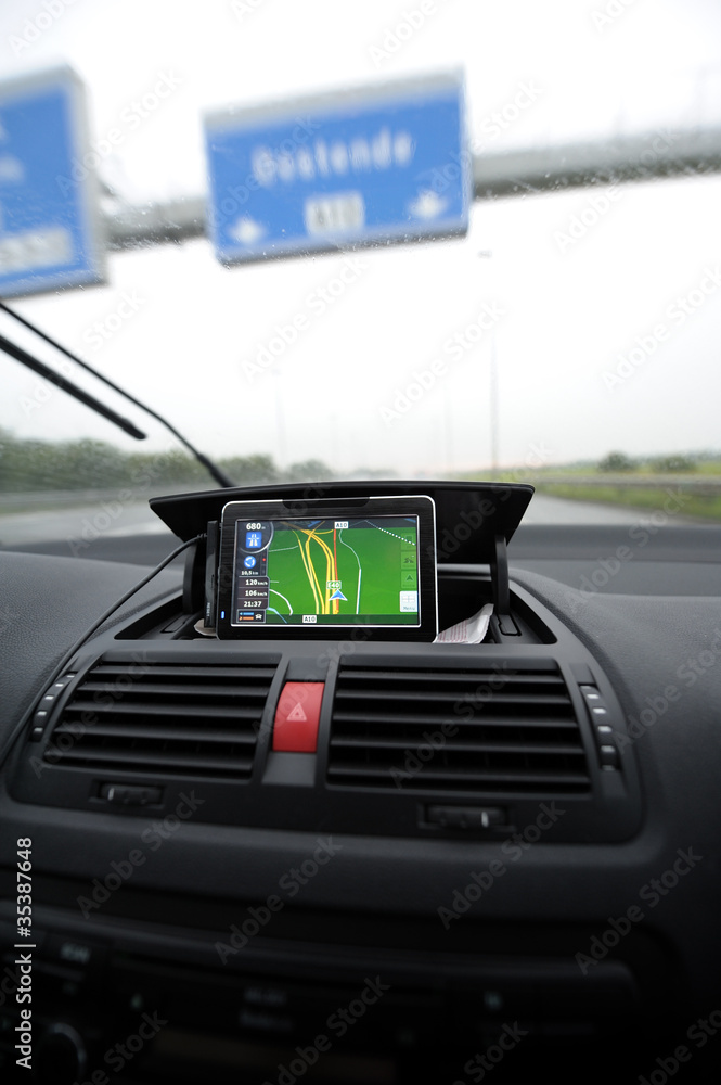 Satellite navigation screen on car dashboard