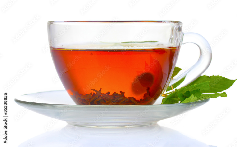 black tea and mint in cup isolated on white black tea and mint in cup isolated on white