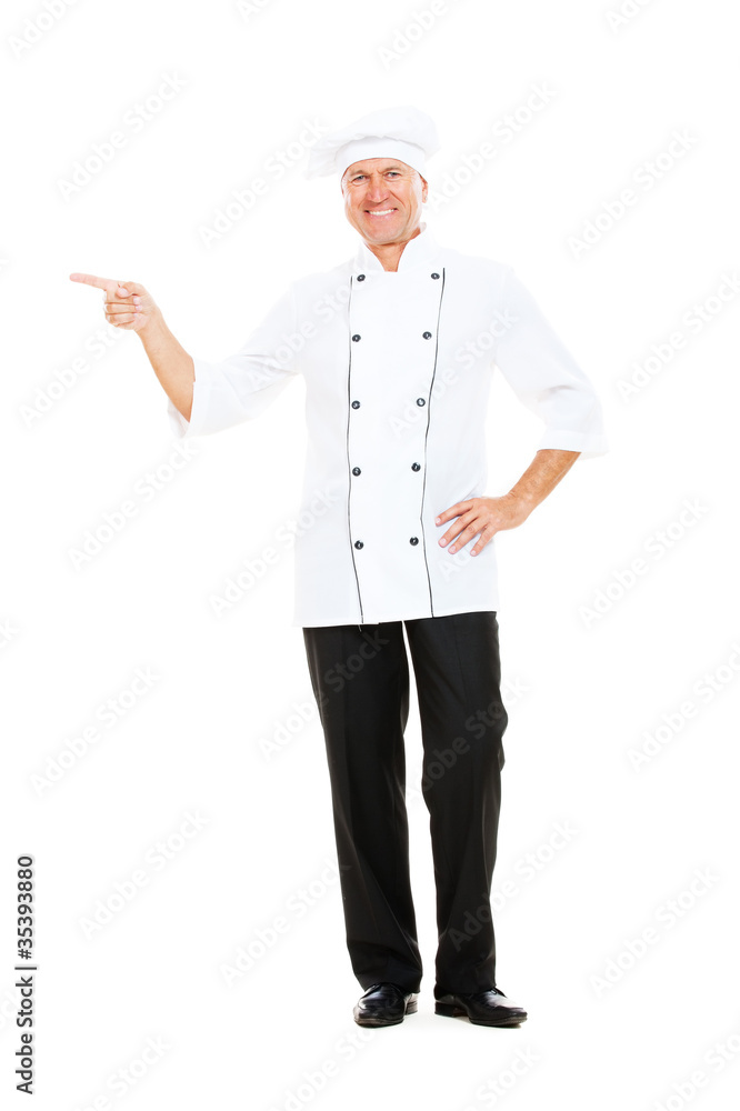 smiley senior chef pointing at something smiley senior chef pointing at something