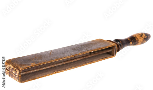 old razor strop isolated on white background