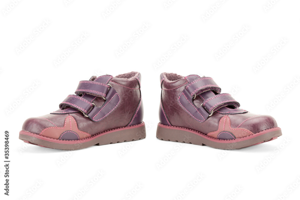 Front view of fall shoes for little girl over white background Front view of fall shoes for little girl over white background