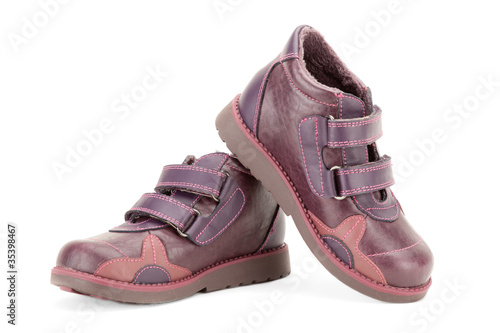 Fall shoes for little girl over white background