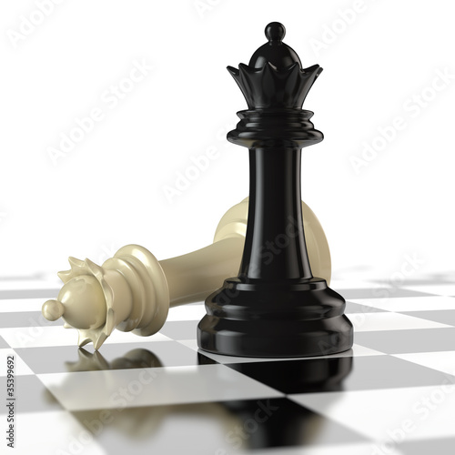 Schachfiguren - schwarze und weiße Damen auf dem Schachbrett photo