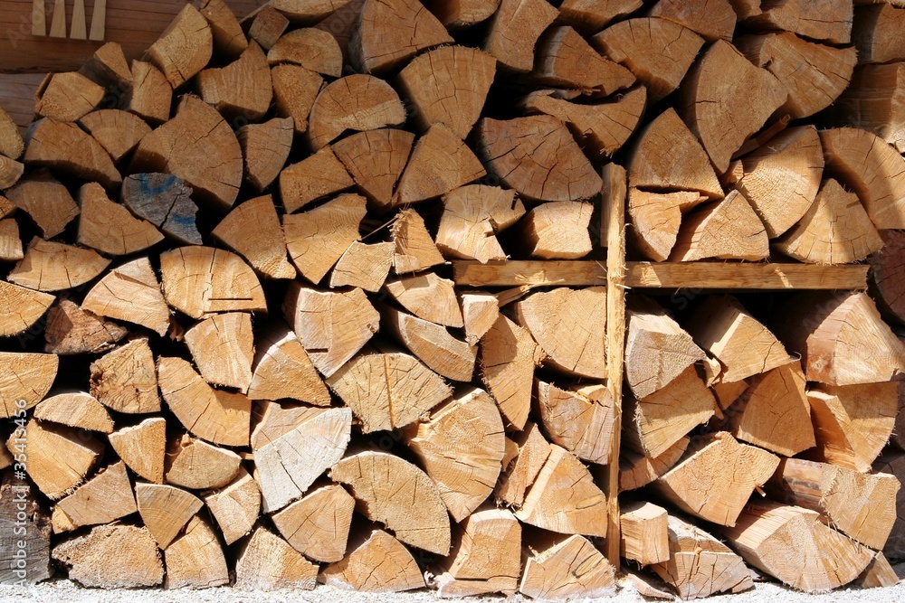 Cutted firewood gathered for fuel outdoor Cutted firewood gathered for fuel outdoor